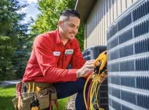 AC repair technician working on service for Southeast Idaho home