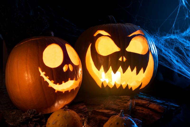 Two spooky Jack-o'-Lanterns with toothy grins to represent the HVAC system scares that an haunt your furnace